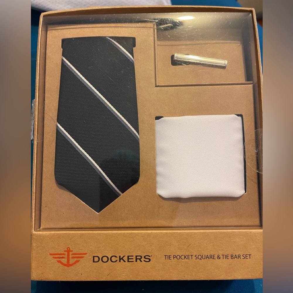 I have a dockers square and tie bar set for men. Brand new